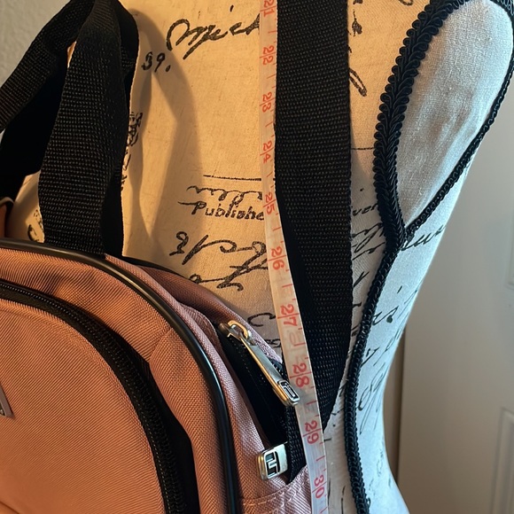 TAG HEUER Messenger bag mauve and black colored. - Picture 11 of 15